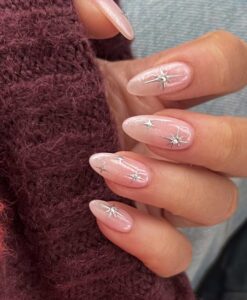 Unghie per Capodanno con stelle luminose Unghie per Capodanno con stelle luminose