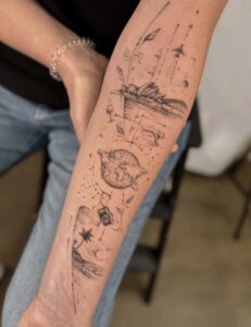 Tatuaggio viaggio con composizione