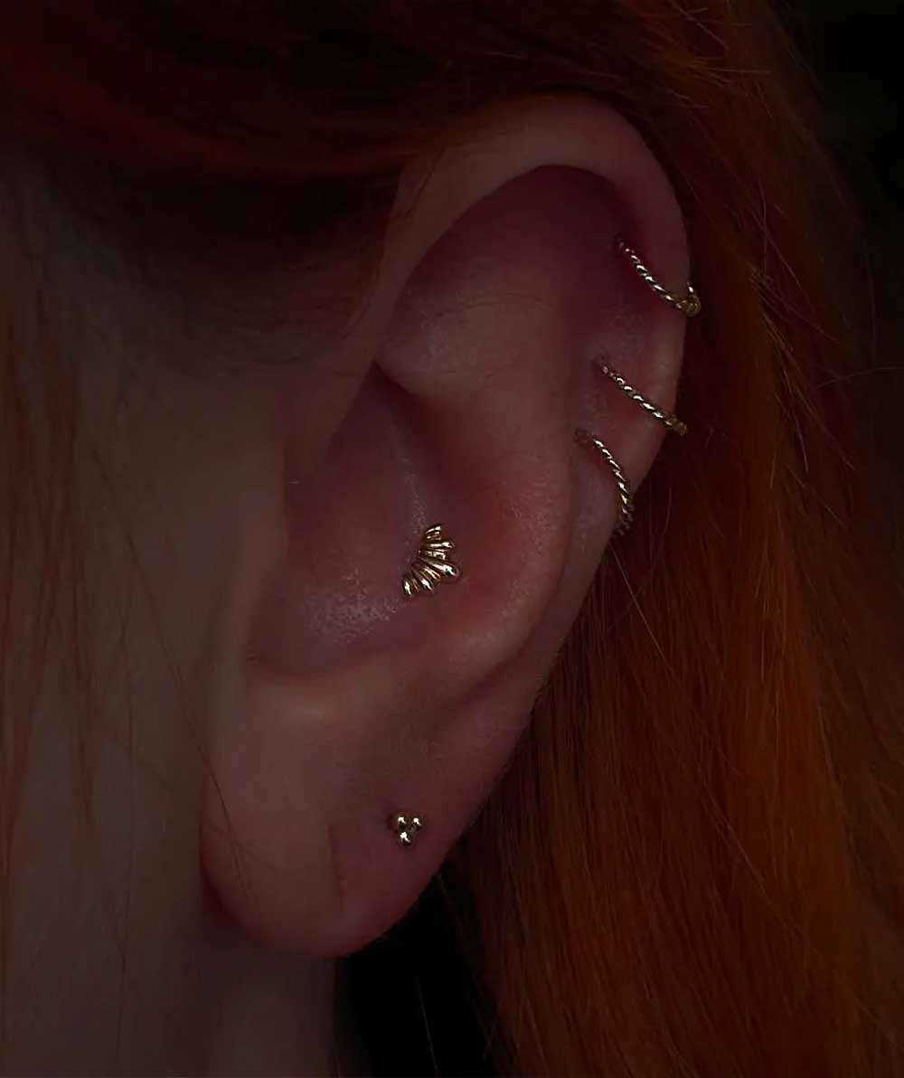 Triple Helix - Piercing alle orecchie Triple Helix - Piercing alle orecchie
