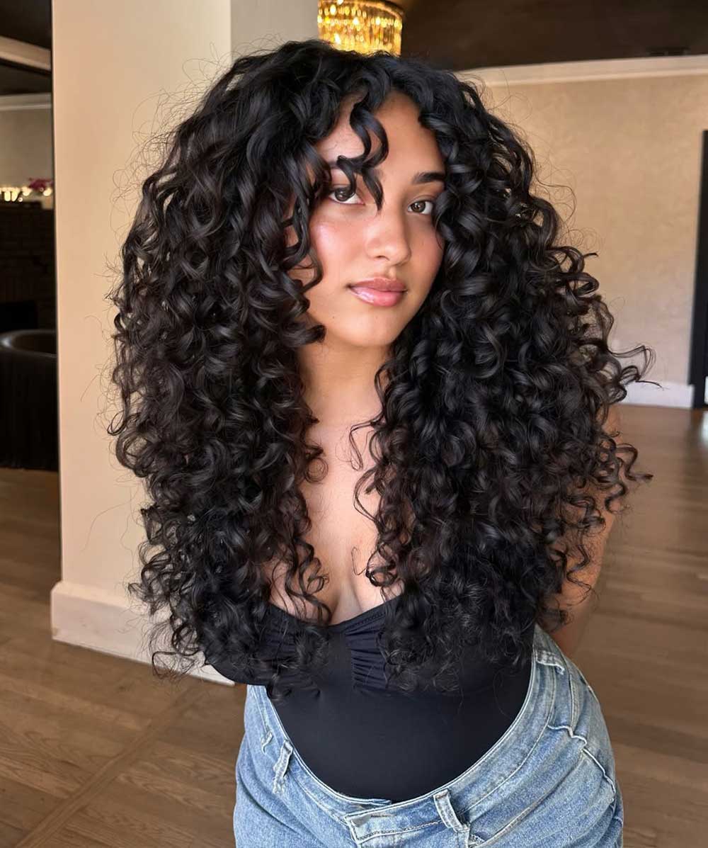 Tagli capelli ricci lunghi scalati Tagli capelli ricci lunghi scalati